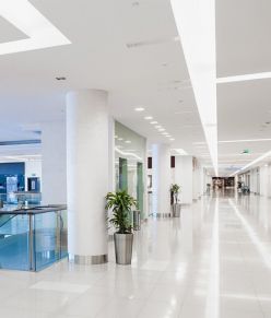 What is the difference between a floor scrubber and an auto scrubber?