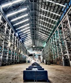 What is the purpose of a floor scrubber?